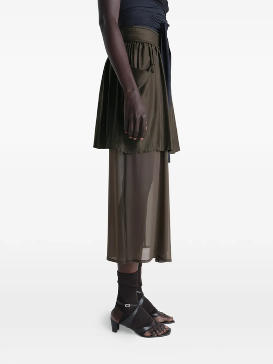 Brown skirt worn by a person, showing the skirt fit