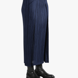 Blue skirt worn by a person, showing the skirt's fit