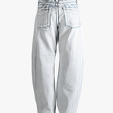 Blue jeans worn by a person, showing the jeans's fit