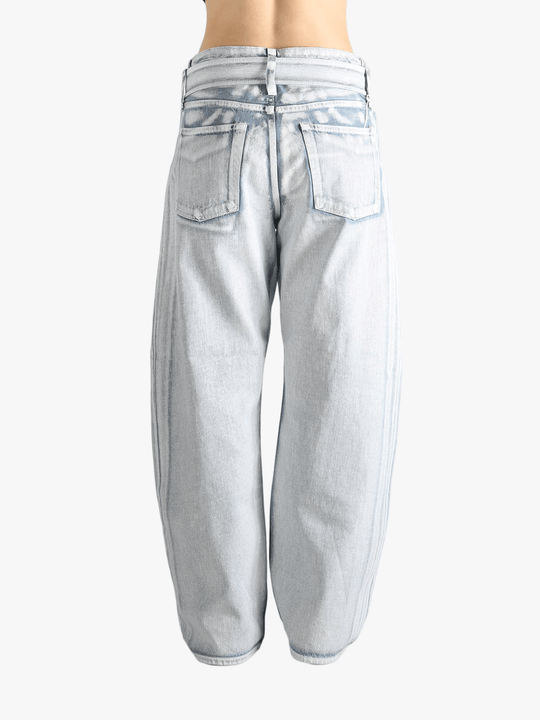 Blue jeans worn by a person, showing the jeans's fit