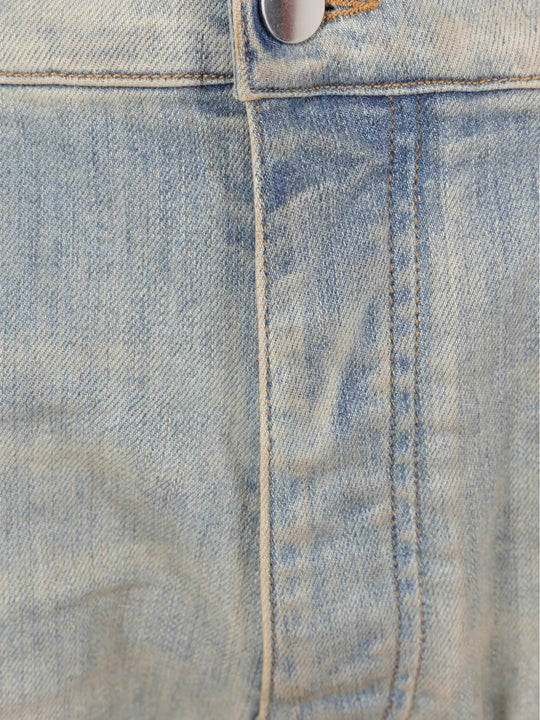 Close up of the blue jeans, showing texture of the cotton fabric