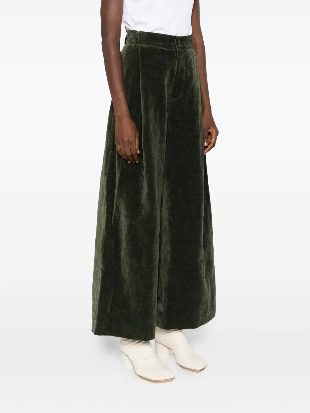 Green pant worn by a person, showing the pant’s fit