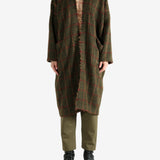 Green coat, full body view