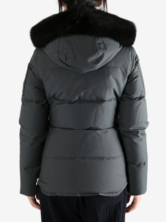 Black jackets worn by a person, showing the jackets fit