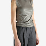 Grey tops worn by a person, showing the tops fit