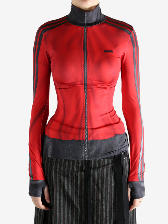 red jacket worn by a person, showing the jacket fit