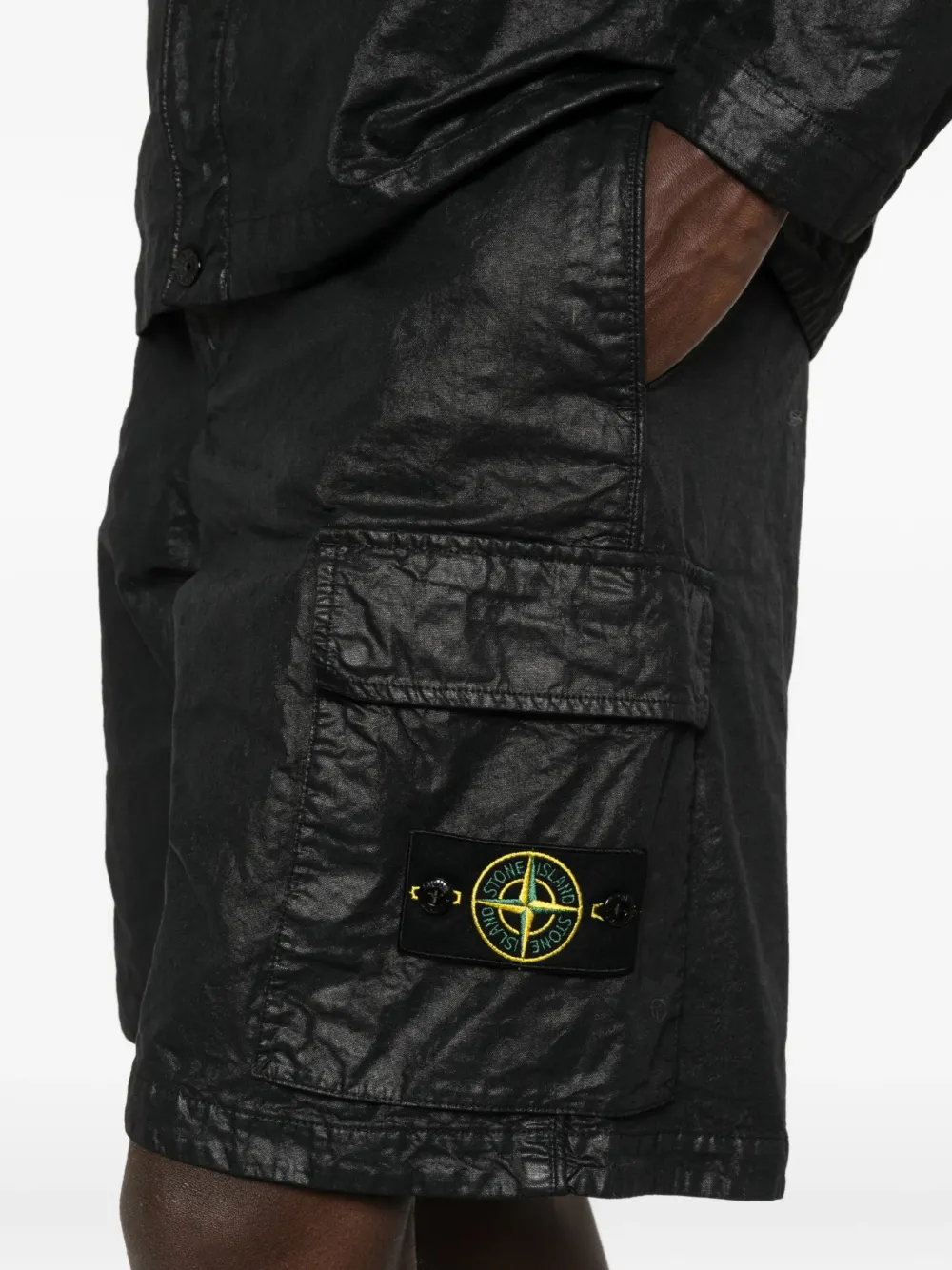 Close up of the black shorts, showing texture of the polyamide fabric