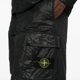Close up of the black shorts, showing texture of the polyamide fabric
