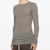 Grey t-shirt worn by a person, showing the t-shirt fit