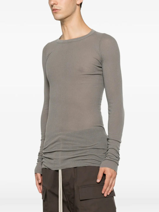 Grey t-shirt worn by a person, showing the t-shirt fit