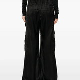 Black pant worn by a person, showing the pant's fit