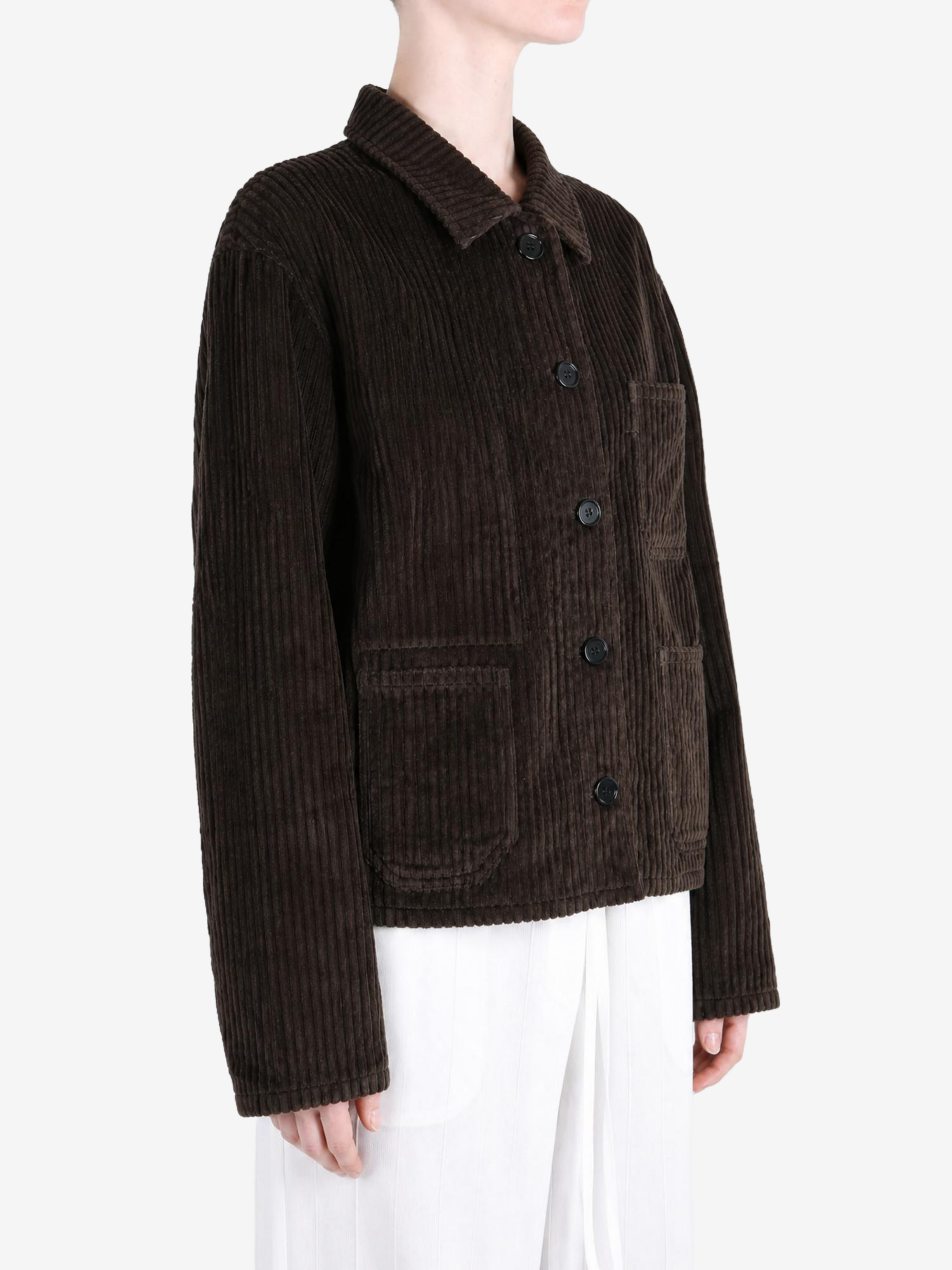 Brown jacket worn by a person, showing the jacket fit
