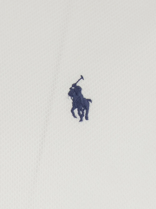 Close up of White t-shirt, showing texture of the 100% cotton fabric