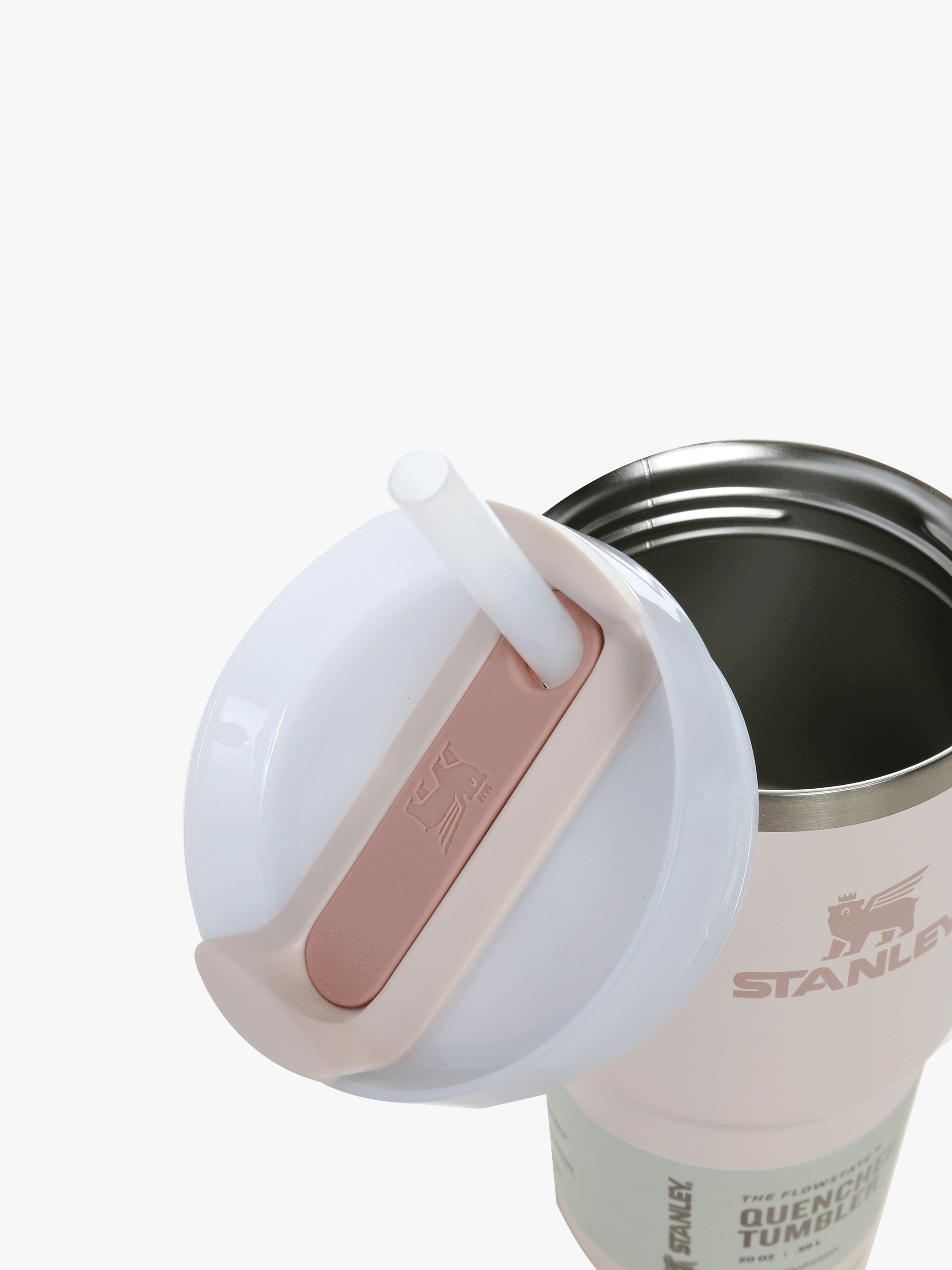 Close up of pink tumbler, showing texture of the steel fabric