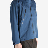 Navy jacket worn by a person, showing the jacket  fit