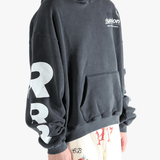 Black hoodie worn by a person, showing the hoodie fit