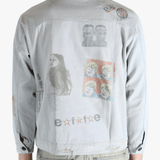 Grey jacket worn by a person, showing the jacket's fit