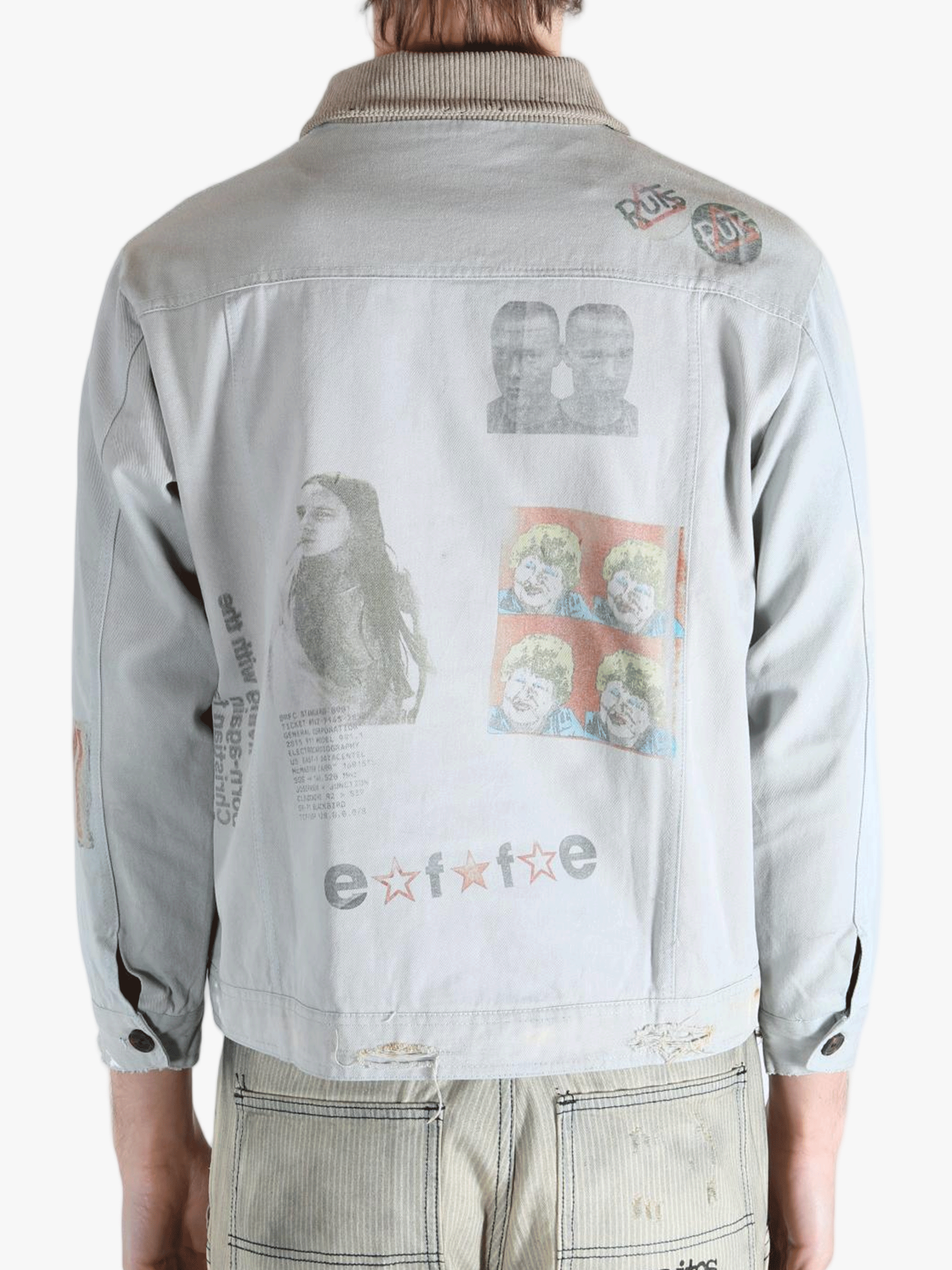 Grey jacket worn by a person, showing the jacket's fit