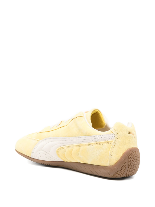 Yellow sneakers, back view