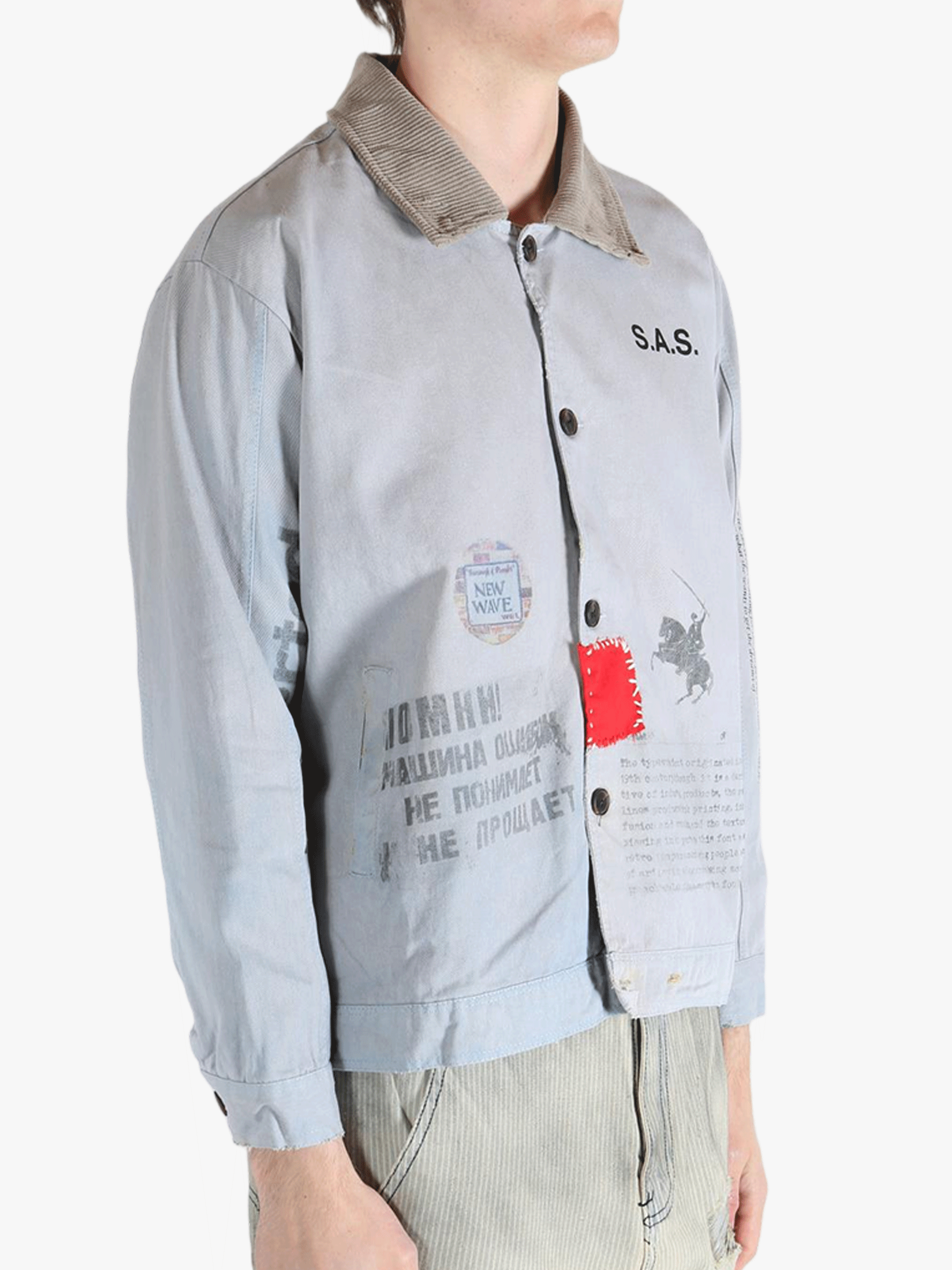 Grey jacket worn by a person, showing the jacket's fit