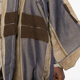 Close up of Tan jacket, showing texture of the 56% viscose/ 35% wool/ 9% polyamide fabric