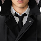 Black jacket worn by a person, showing the jacket fit