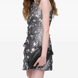 Black bags worn by a person, showing the bags fit