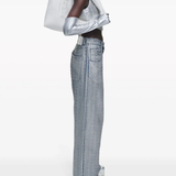 White bag worn by a person, showing the bag's fit