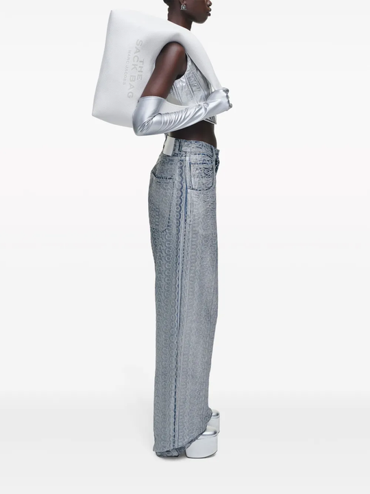 White bag worn by a person, showing the bag's fit