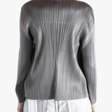 Grey cardigan worn by a person, showing the cardigan's fit