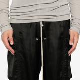 Close up of black pants, showing texture of the cotton fabric