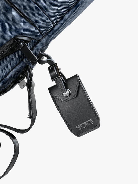 Close up of navy bag, showing texture of the nylon fabric