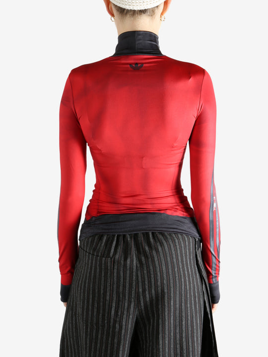 red jacket worn by a person, showing the jacket fit