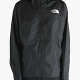 Black jacket worn by a person, showing the jacket's fit