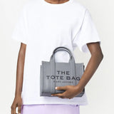 Grey bag worn by a person, showing the bag's fit