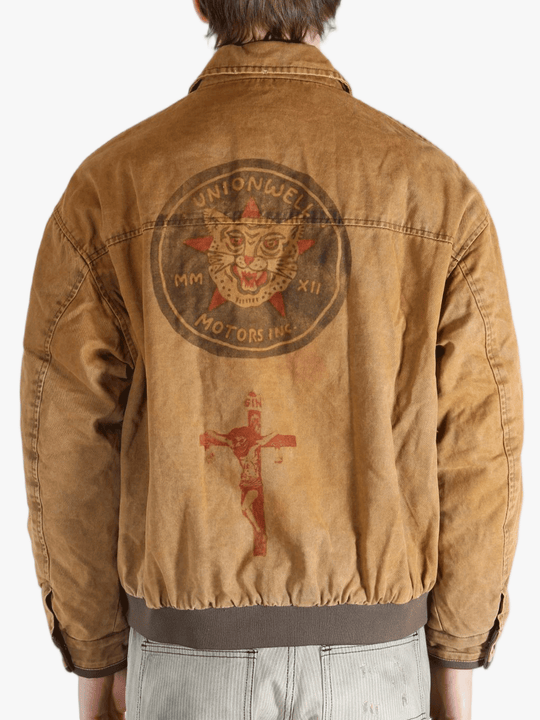 Brown jacket worn by a person, showing the jacket's fit