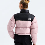 Pink jacket worn by a person, showing the jacket fit
