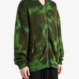 Green jacket worn by a person, showing the jacket fit