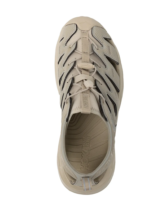 Tan sandals, vertical view
