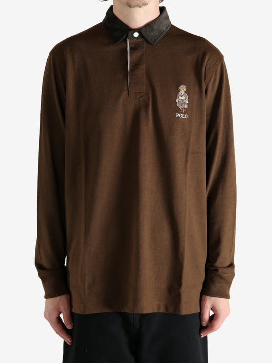 Brown shirt worn by a person, showing the shirt's fit