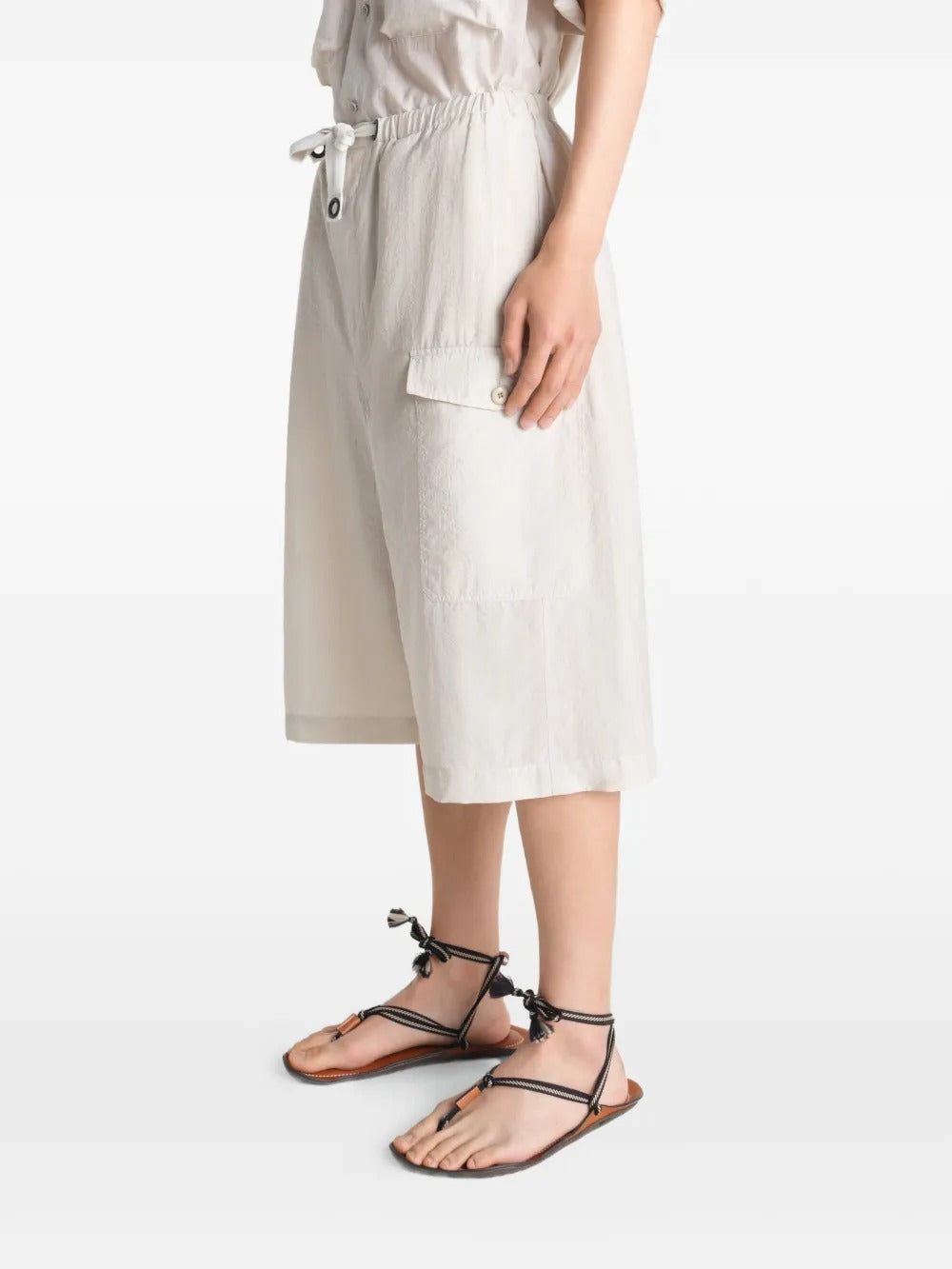 White short worn by a person, showing the short's fit