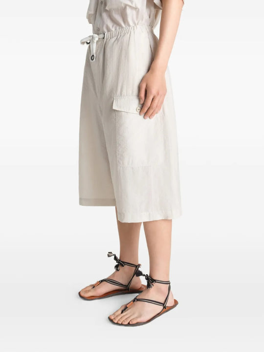 White short worn by a person, showing the short's fit