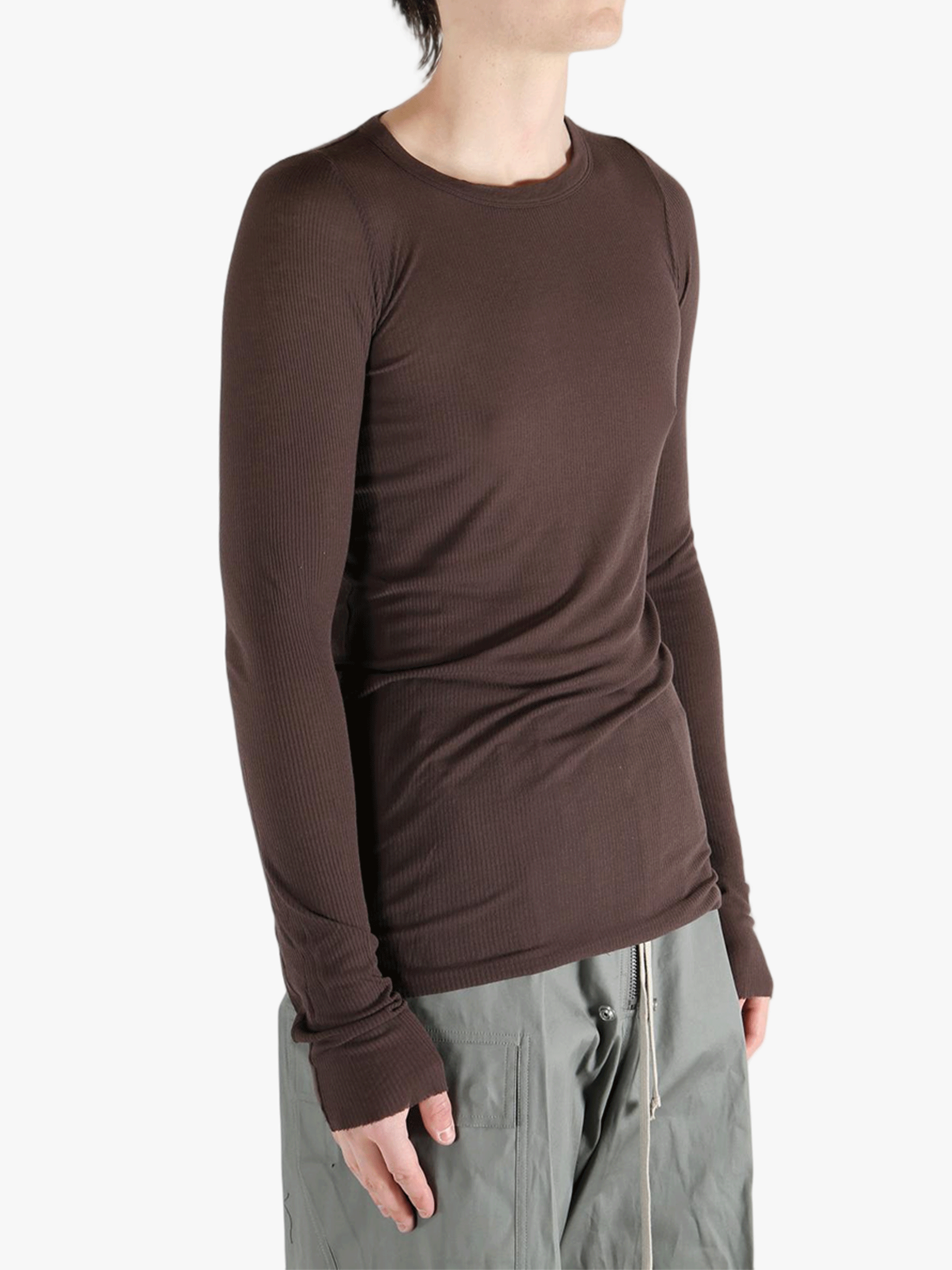 Brown t-shirt worn by a person, showing the shirt's fit