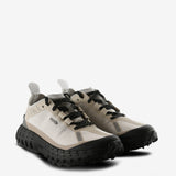 Tan sneakers, side view