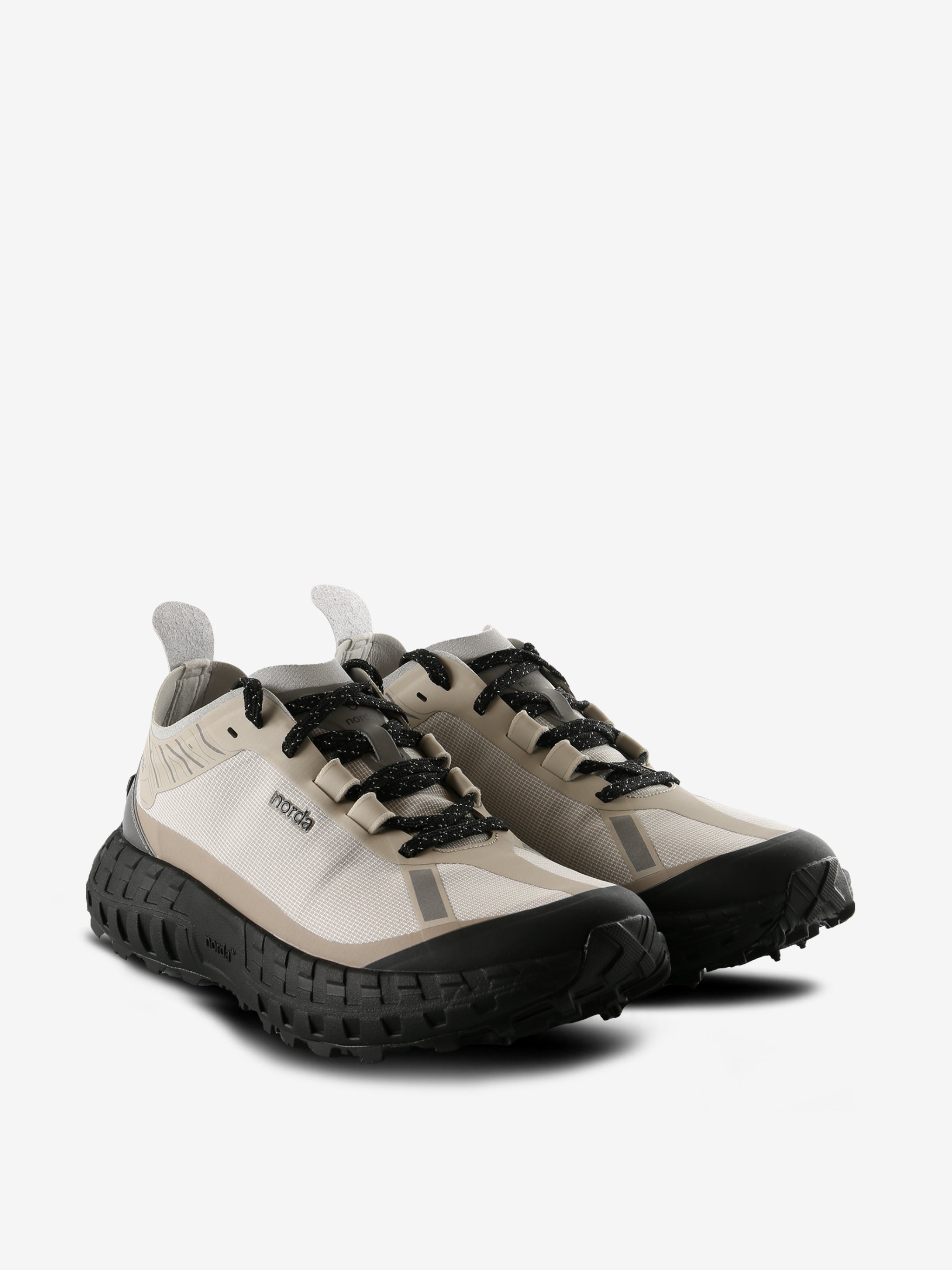 Tan sneakers, side view