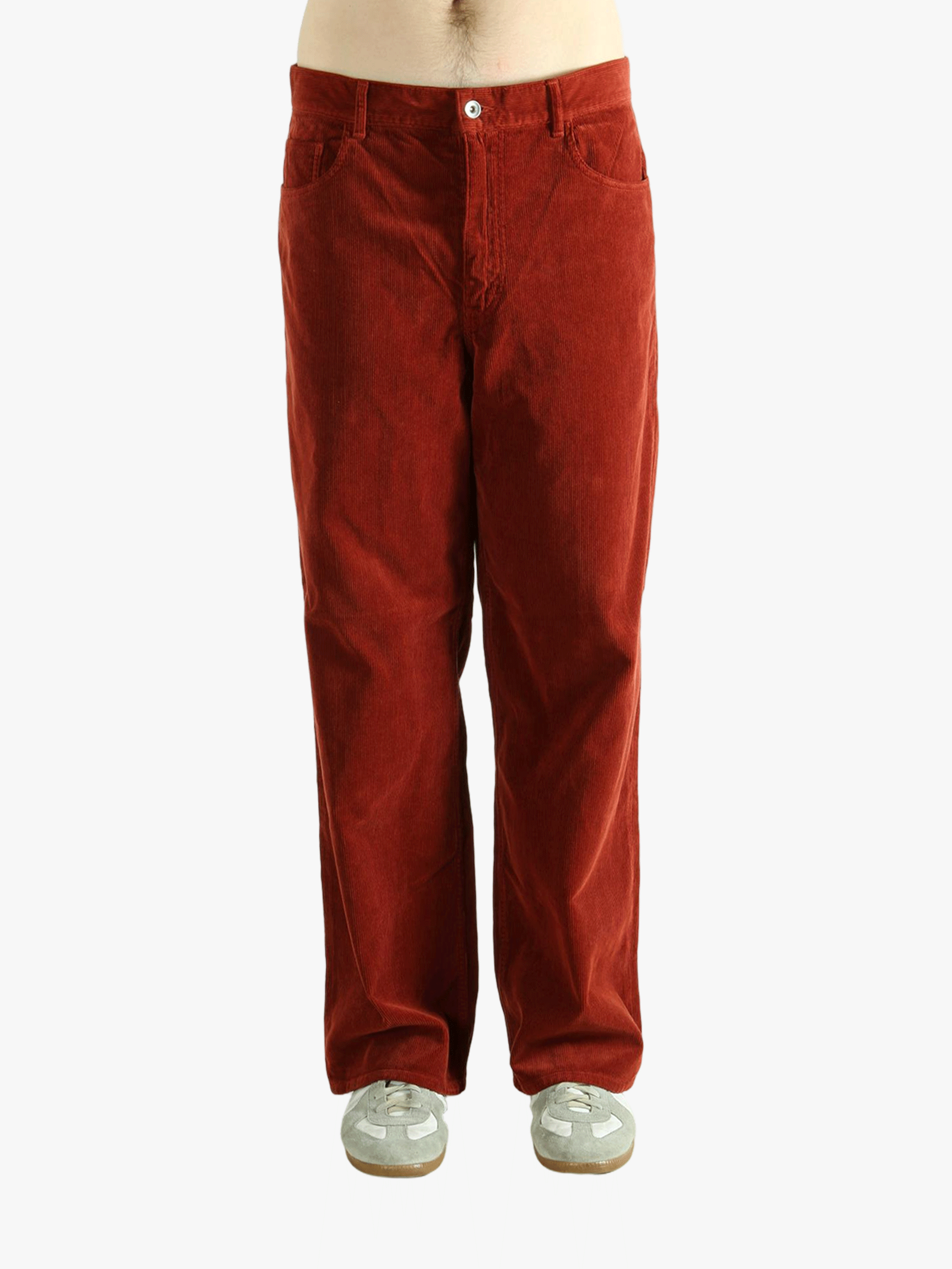 Red pants worn by a person, showing the pants fit