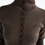 Brown top worn by a person, showing the top fit