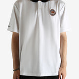 White shirt worn by a person, showing the shirt's fit