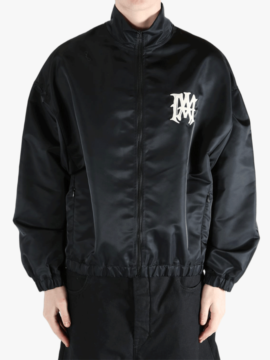 Black jacket worn by a person, showing the jacket's fit