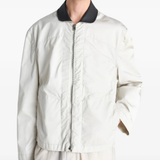 Tan jacket worn by a person, showing the jacket fit